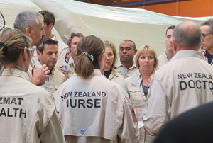 A group of volunteers in uniform. 