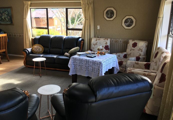 A photo of a lounge room in Rest Home and Memory Care