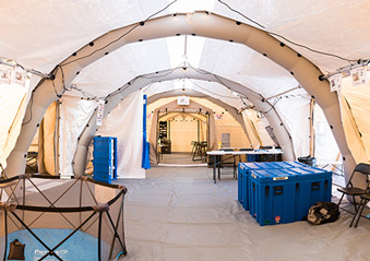 View inside the multi-room fixed tent facility. 